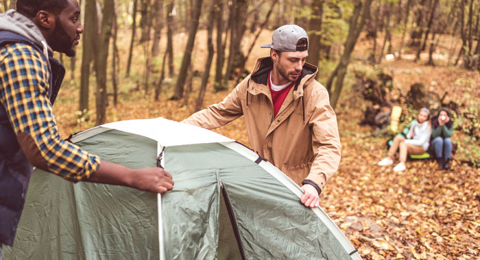 Setting-up-tent (Shutterstock, LightField Studios)