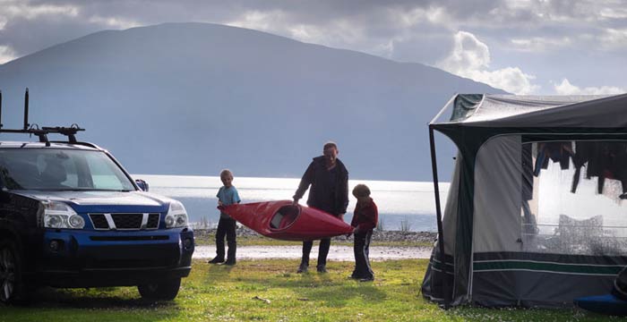 kids-and-dad-on-cashel-campsite-with-canoe
