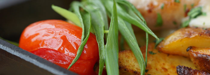 cherry tomato and potatoes (Shutterstock, Raisa Lachoque)