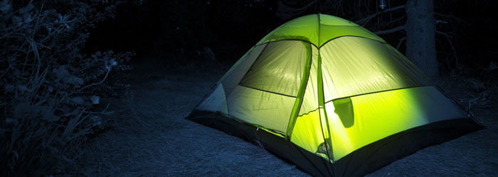 Tent lit up in the dark (Shutterstock, welcomia)